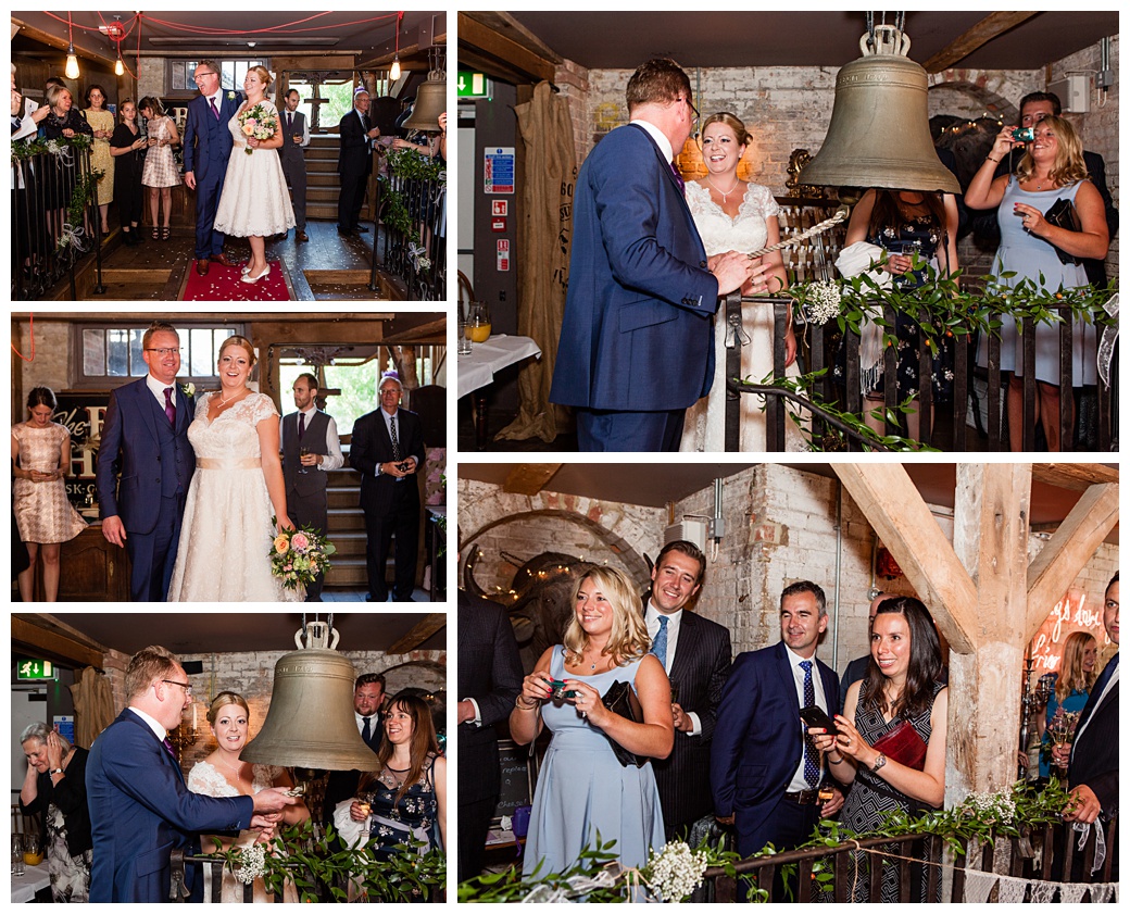 bride and groom ringing the bell at the bell inn ticehurst