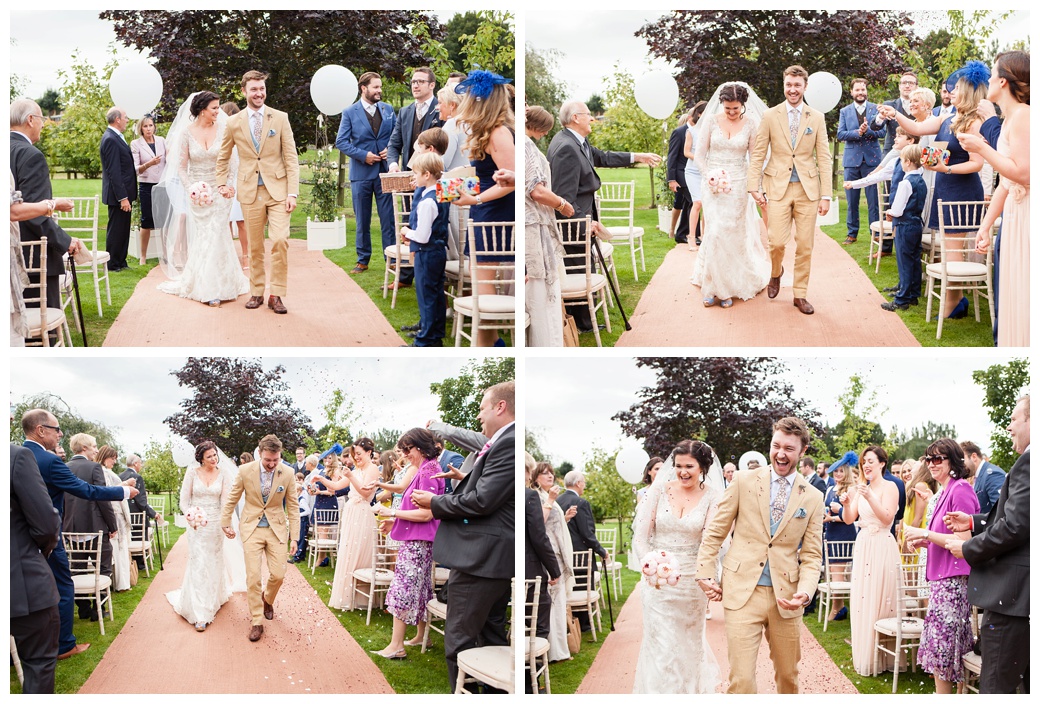 confetti throwing as bride and groom walk up the aisle