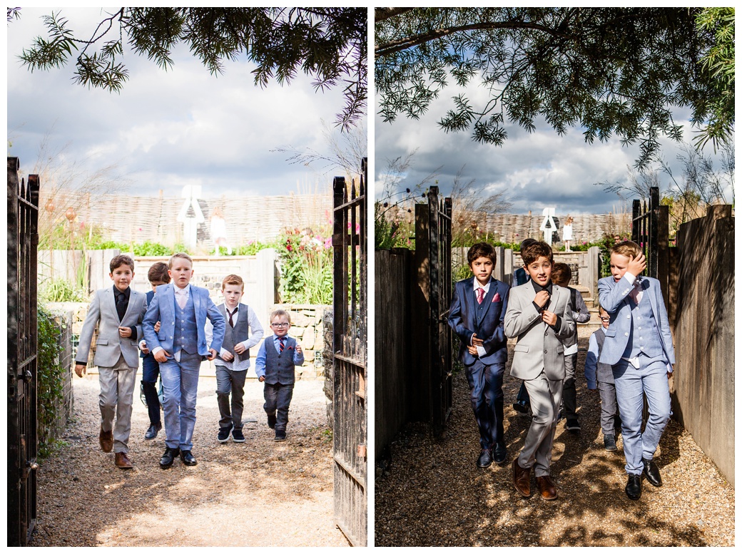 Wedding at The Bell Inn Ticehurst young boys in suits walking